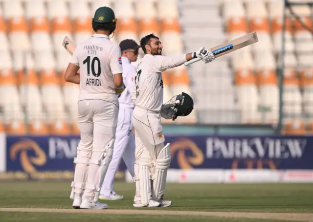 Pakistan's Salman Ali Agha celebrates reaching his hundred against England in Multan