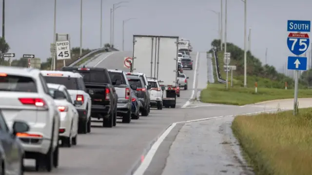 Cars leaving on the main highway