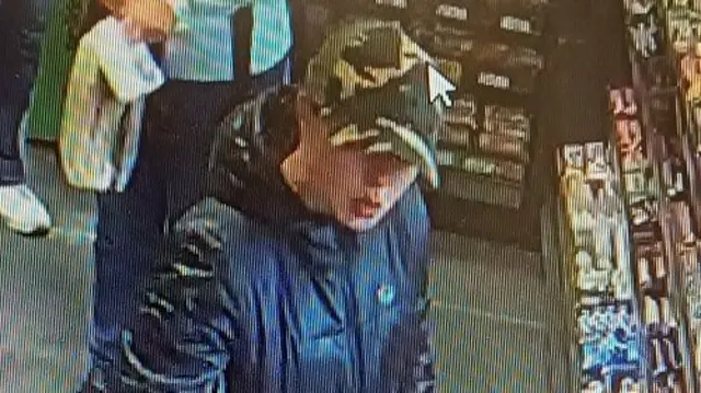 CCTV image of Victoria Taylor, wearing a camouflage hat