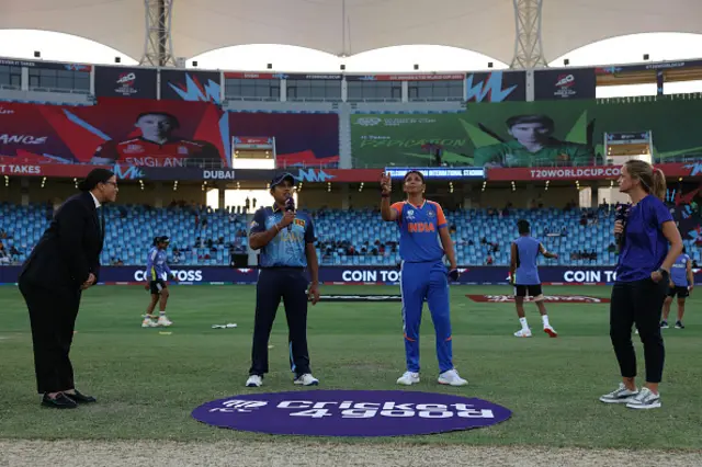 Harmanpreet Kaur of India tosses the coin at the coin toss