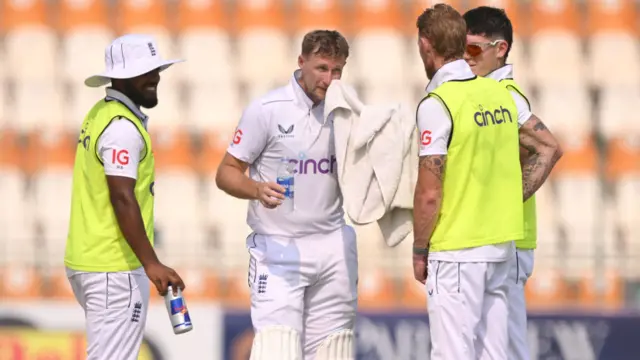 Ben Stokes on 12th man duties for Joe Root during day three of the Test match between Pakistan and England in Multan