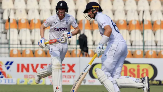 England's Harry Brook and Joe Root in action as they run between the wickets against Pakistan