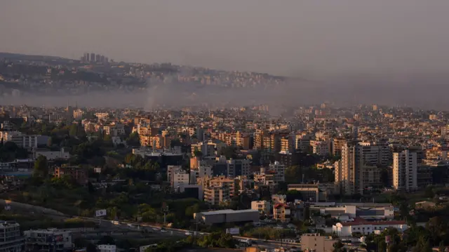 The scene in Beirut this morning as smoke billows after a night of strikes