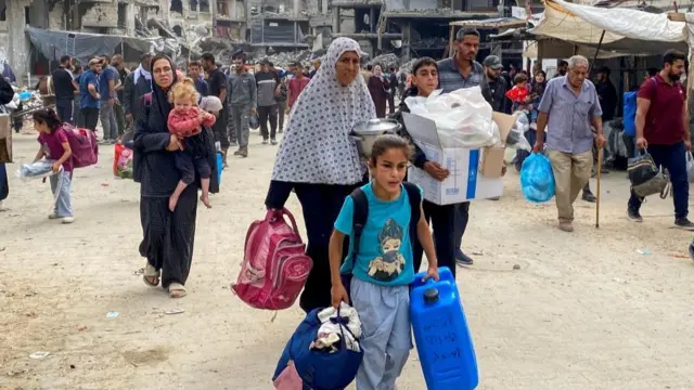 Palestinians displaced as they flee areas of northern Gaza Strip following Israeli evacuation order