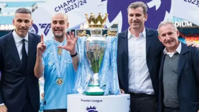 Khaldoon Al Mubarak with Pep Giardiola, Ferran Soriano and Txiki Begiristain after Manchester City win the Premier League in 2024