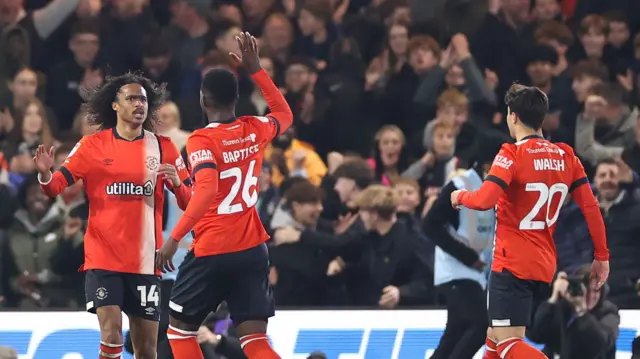 Luton celebrate Tahith Chong's equaliser