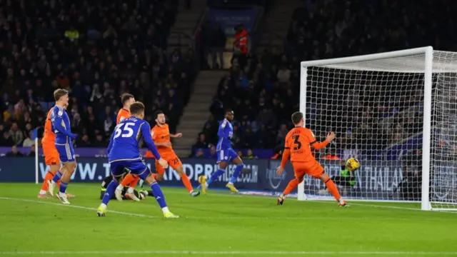 Leif Davis of Ipswich Town scores an own goal during the Sky Bet Championship match between Leicester City and Ipswich Town at The King Power Stadium