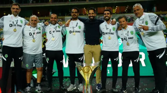 Sporting's staff celebrate with head coach Ruben Amorim after winning the Portuguese Super Cup