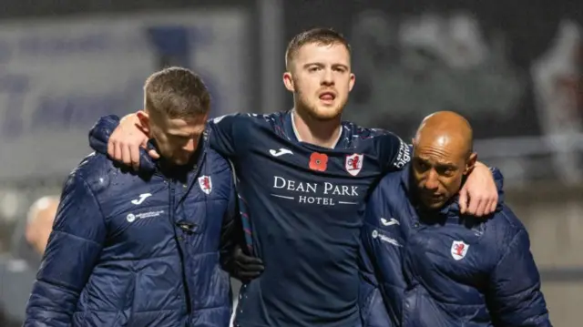 KIRKCALDY, SCOTLAND - NOVEMBER 01: Raith Rovers' Callum SMith is helped off after getting an injury during a William Hill Championship match between Raith Rovers and Ayr United at Stark's Park, on November 01, 2024, in Kirkcaldy, Scotland. (Photo by Ross Parker / SNS Group)