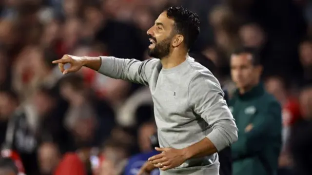 Sporting coach Ruben Amorim signals to his players from the touchline