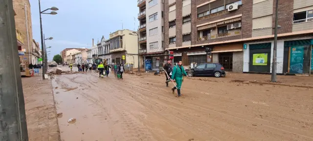 People helping with clear up in Valencia