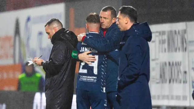 KIRKCALDY, SCOTLAND - NOVEMBER 01: Raith Rovers manager Neill Collins with Lewis Jamieson during a William Hill Championship match between Raith Rovers and Ayr United at Stark's Park, on November 01, 2024, in Kirkcaldy, Scotland. (Photo by Ross Parker / SNS Group)