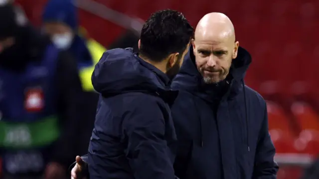 Ruben Amorim shakes hands with Erik ten Hag