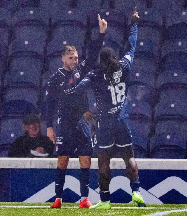 KIRKCALDY, SCOTLAND - NOVEMBER 01: Raith Rovers' Lewis Jamieson celebrates with Fankaty Dabo after scoring to make it 2-0 during a William Hill Championship match between Raith Rovers and Ayr United at Stark's Park, on November 01, 2024, in Kirkcaldy, Scotland. (Photo by Ross Parker / SNS Group)