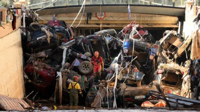 Cars piled high block a tunnel on the border of the Benetusser and Alfafar municipalities near Valencia