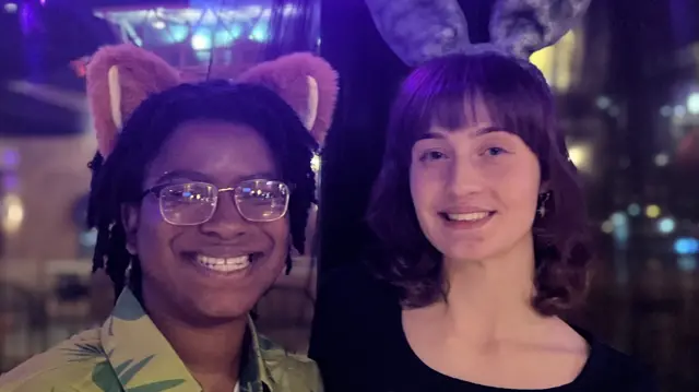 Two young people at a Halloween event