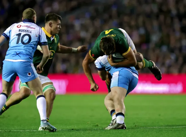 Eben Etzebeth of South Africa is challenged by Ewan Ashman of Scotland during the Autumn Nations Series 2024 match between Scotland and South Africa at the Scottish Gas Murrayfield on November 10, 2024 in Edinburgh, Scotland.