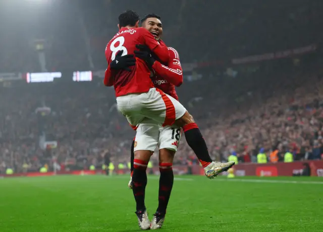 Fernandes and Casemiro celebrate