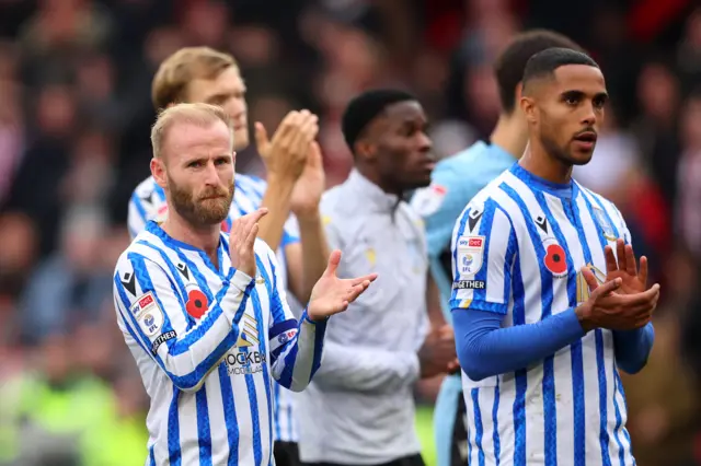 Barry Bannan of Sheffield Wednesday applauds the fans after the team's defeat