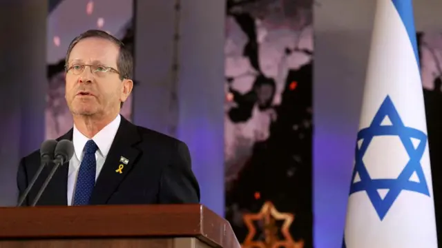 Isaac Herzog delivers a speech during a memorial ceremony of the Hamas attack on 7 October last year