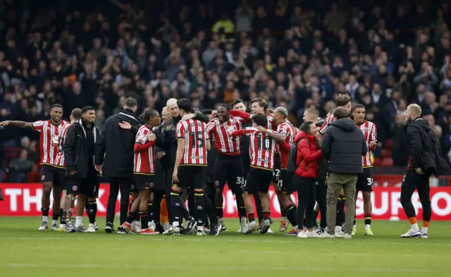 Sheffield United players celebrate at the final whistle