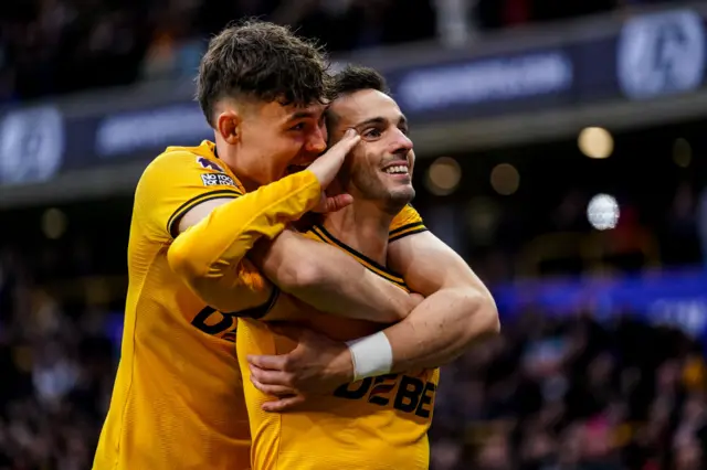 Jorgen Strand Larsen of Wolverhampton Wanderers FC and Pablo Sarabia of Wolverhampton Wanderers FC celebrate