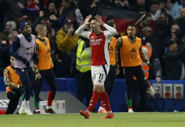 Martinelli celebrates after scoring against Chelsea