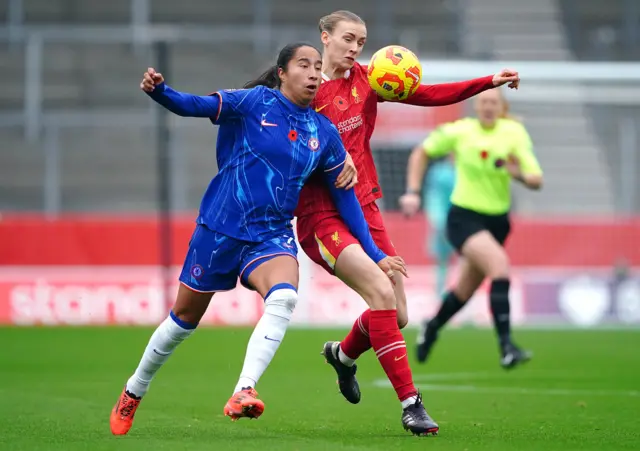 Ramirez and Clark battle for the ball