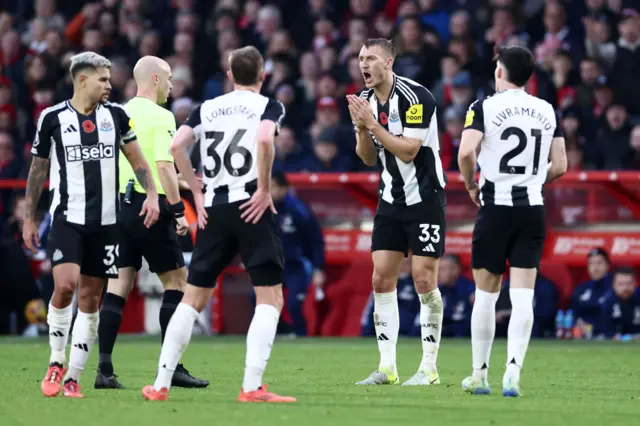 Dan Burn pleads with referee