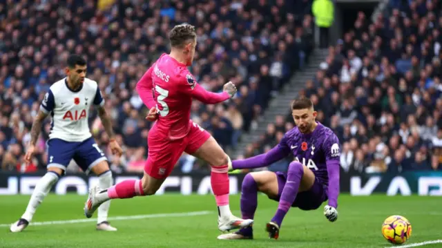 Sammi Szmodics of Ipswich looks to beat Tottenham's goalkeeper