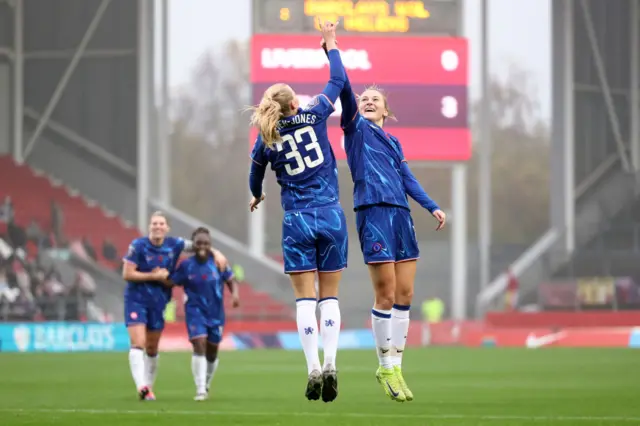 Chelsea players celebrate Beever-Jones' goal