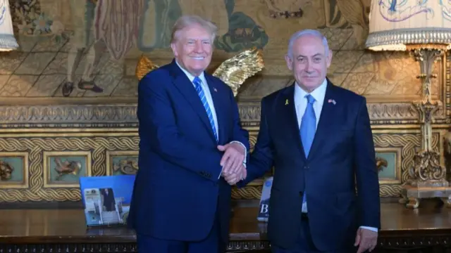 Trump and Netanyahu shake hands