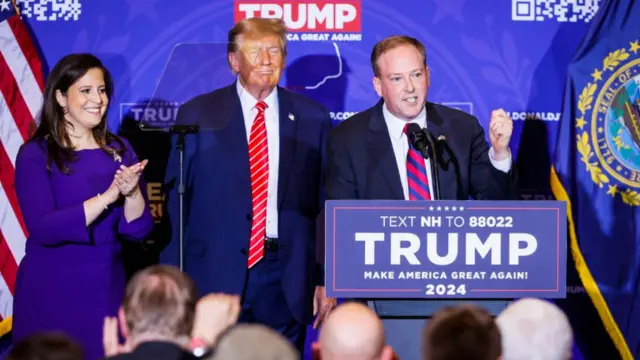 Trump standing behind Zeldin as he speaks at a campaign event