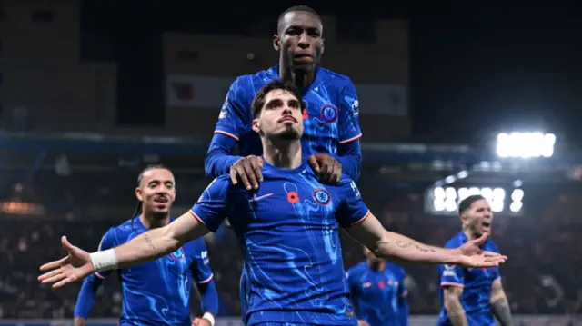 Pedro Neto of Chelsea celebrates scoring his team's goal against Arsenal.
