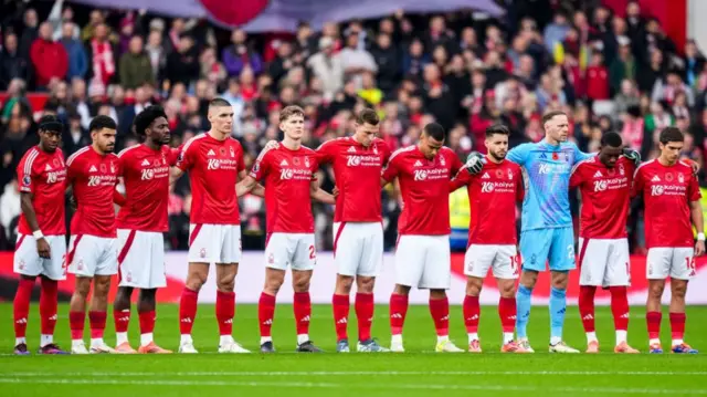 Nottingham Forest players line up before kick-off.