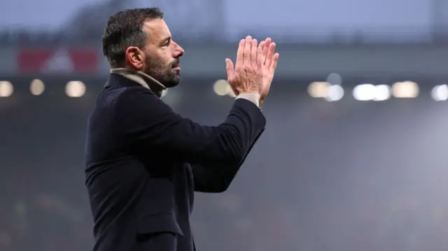 Ruud van Nistelrooy applauds the fans.
