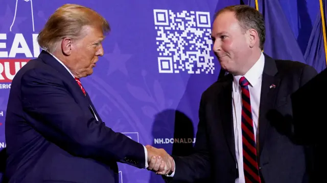 Former U.S. President and Republican presidential candidate Donald Trump greets former U.S. Representative Lee Zeldin at a rally ahead of the New Hampshire primary election in Concord, New Hampshire, U.S. January 19, 2024