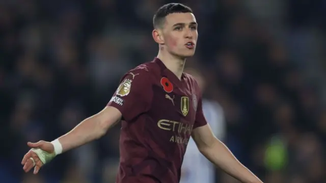 Phil Foden of Manchester City looks disappointed.