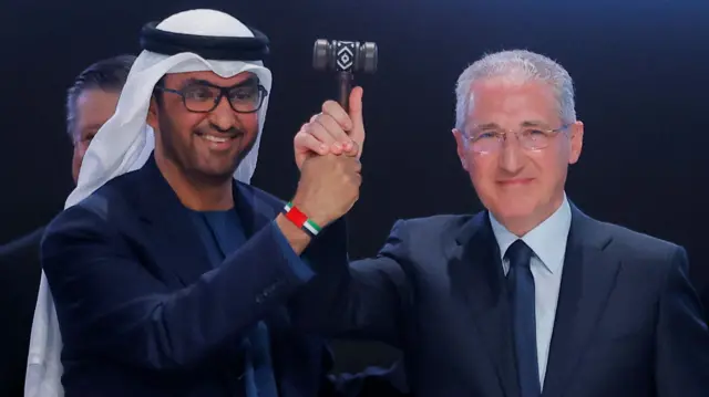 Sultan al-Jaber, COP28 President, passes the hammer to Mukhtar Babayev, the COP29 President