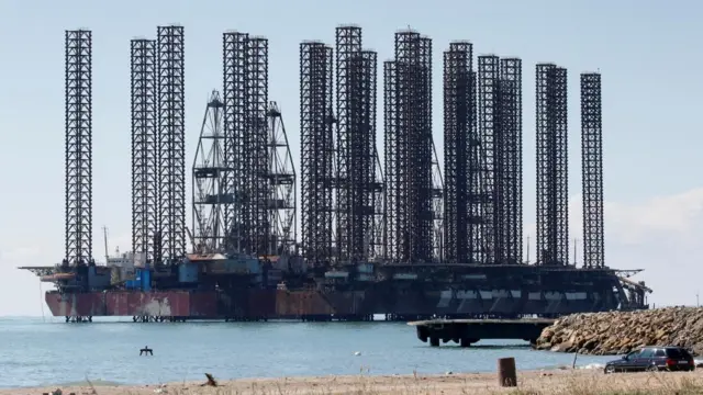 An offshore oil rig is seen in the Caspian Sea near Baku, Azerbaijan