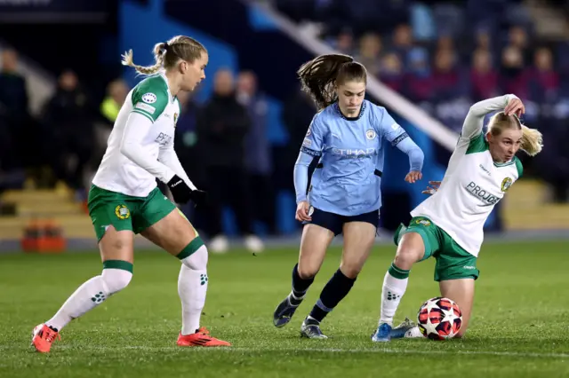 Jess Park battles for possession with Emilie Joramo