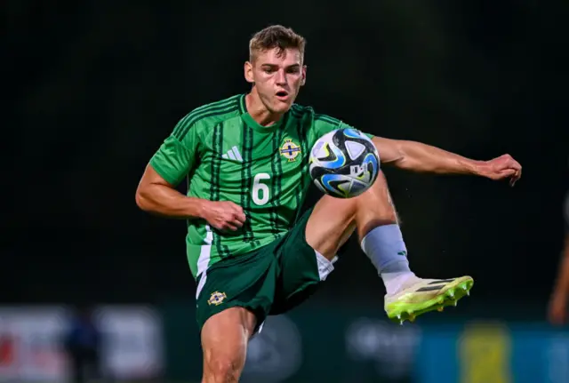 Justin Devenny in action for Northern Ireland's under-21s against England