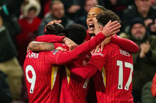 Liverpool celebrate scoring against Aston Villa