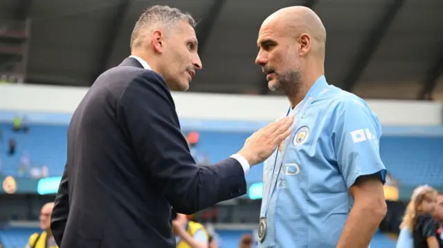 Khaldoon Al Mubarak, chairman of Manchester City, with Pep Guardiola.