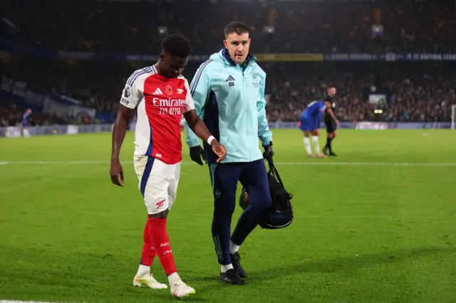 Bukayo Saka limps off against Chelsea