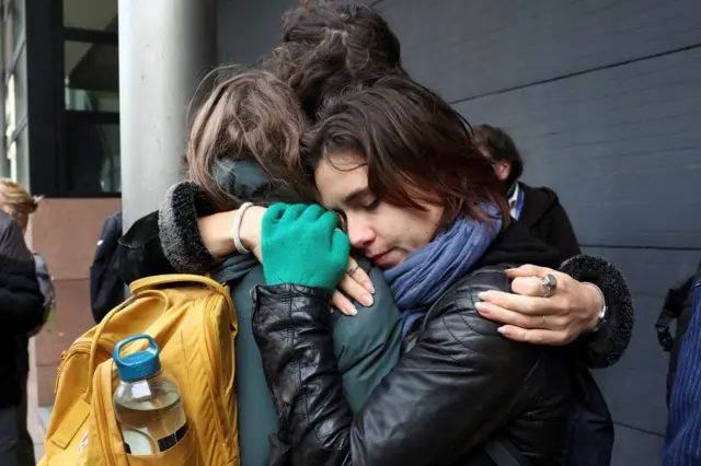 Supporters of Milieudefensie (Friends of the Earth) react outside The Hague