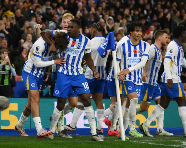 Matt O'Riley of Brighton & Hove Albion celebrates scoring with team mates