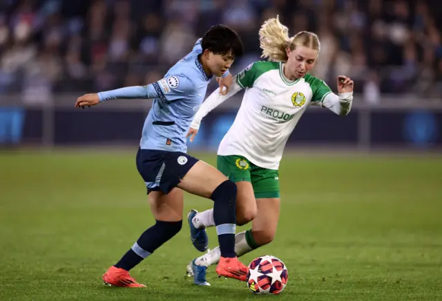 Aoba Fujino of Manchester City battles for possession with Emilie Joramo