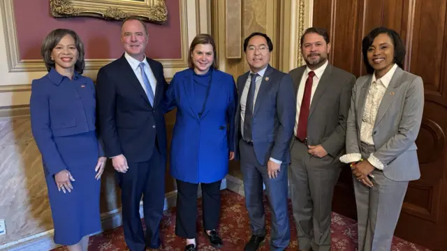 Lisa Blunt Rochester, Adam Schiff, Elissa Slotkin, Andy Kim, Ruben Gallego and Angela Alsobrooks pose for a group photo