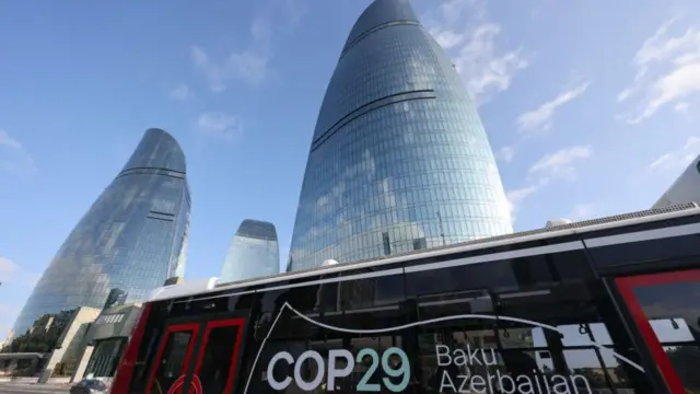 A city bus near the Flame Towers during the COP29 climate change conference in Baku, Azerbaijan, on Sunday, Nov. 10, 2024.